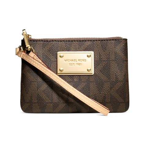 jet set signature wristlet.